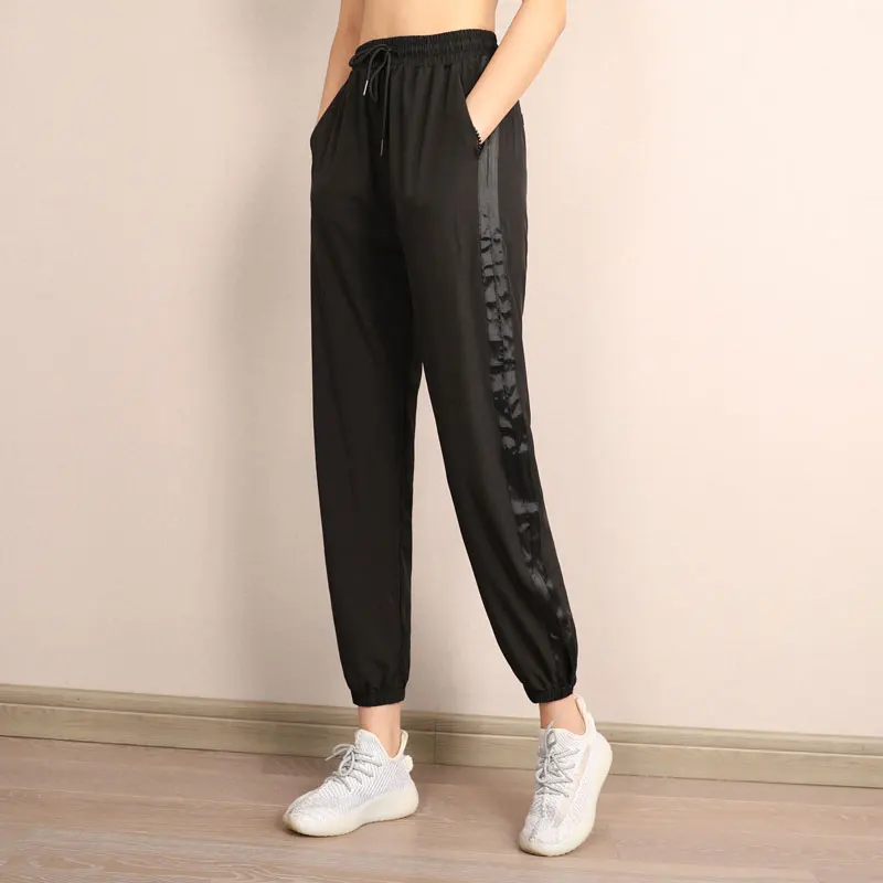 Женские брюки для латиноамериканских танцев черная/зеленая профессиональная