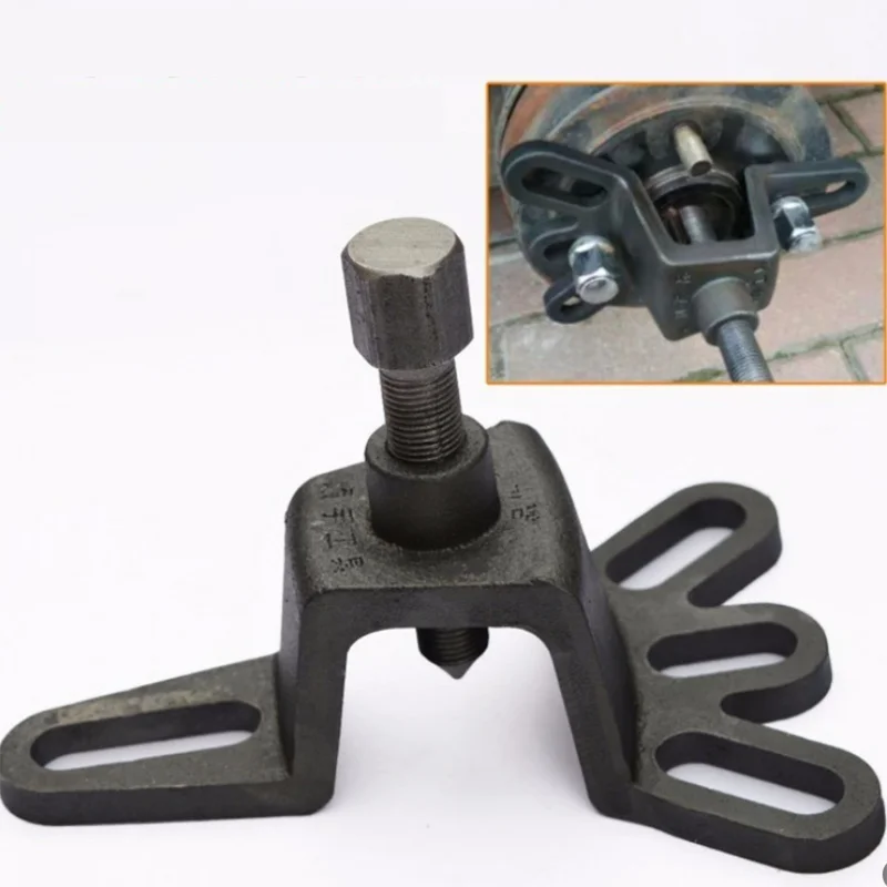 Устройство для снятия задней оси с тормозным барабаном трехколесного велосипеда для ремонта мотоциклов.