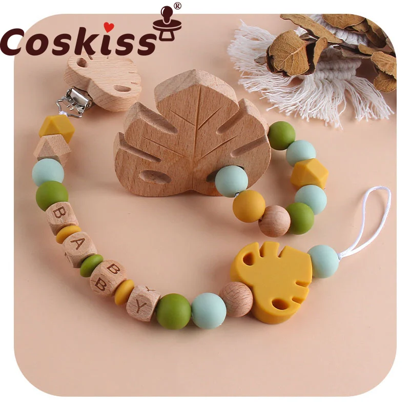 

Coskiss Baby Pacifier Chain Teether Rattle Set Nipple Clip Holder Infant Silicone Wooden Leaf Teething Soother Molar Toy