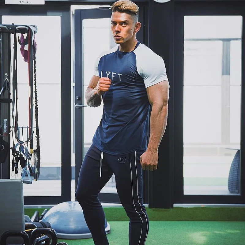 

New Stylish Plain Tops Fitness Mens T Shirt Short Sleeve Muscle Joggers Bodybuilding Tshirt Male Gym Clothes Slim Fit Tee Shirt