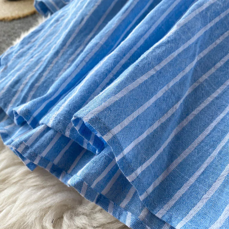 Женская блузка в полоску с перекрестными завязками V-образным вырезом и