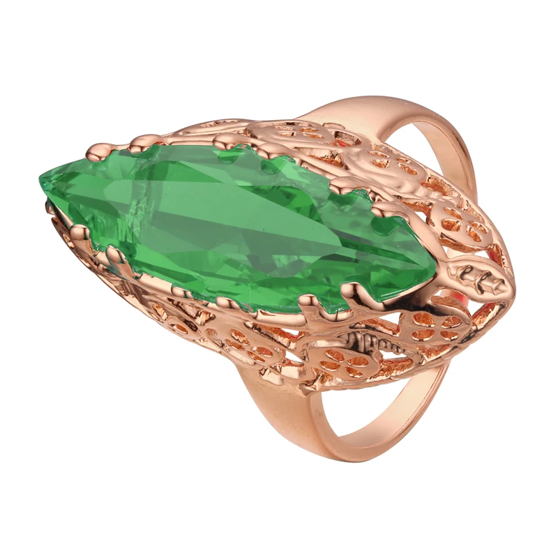 Женское кольцо из розового золота 2020 пробы с фианитом и овальным красным камнем |