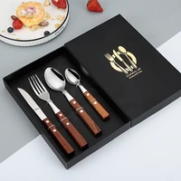 304 western cutlery knife and fork spoon rosewood handle four piece knife and fork spoon restaurant steak knife and fork set