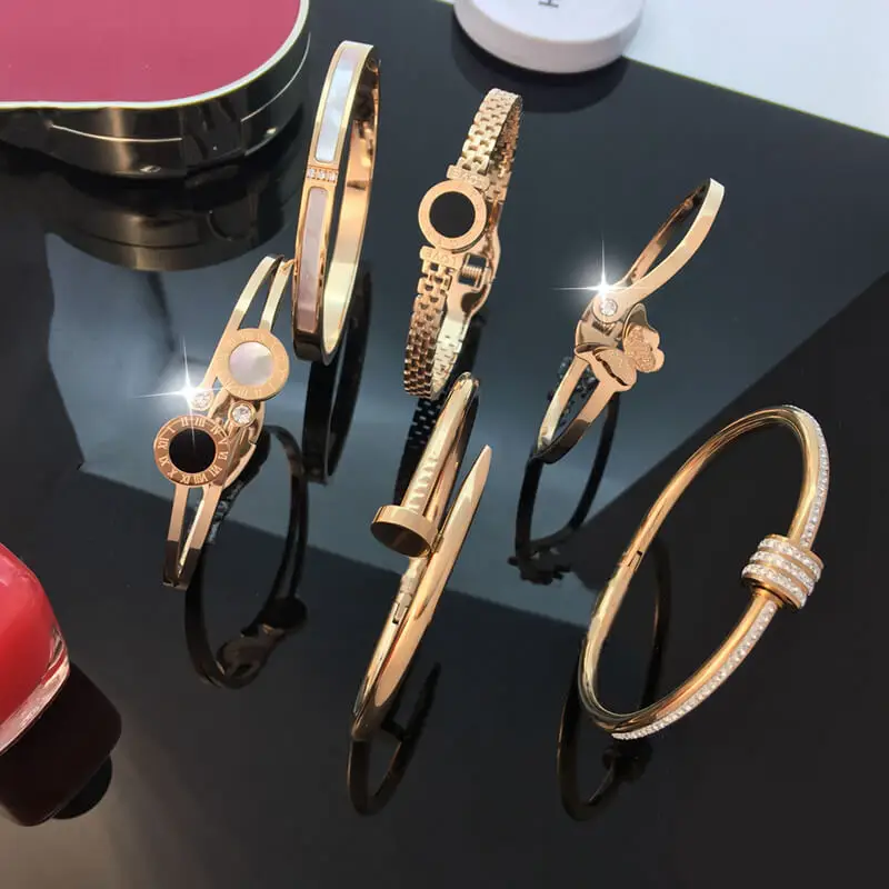 

6 luxury titanium plated steel bracelets with adjustable openings size fashion jewelry present