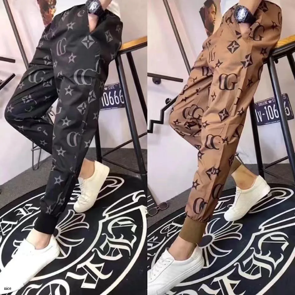 

2021 Spring And Summer New Casual Pants Hip Hop High Street Fashion Retro Print Pattern Trend Men And Women Same Style Pants