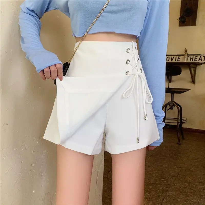 

In Spring Summer and Autumn Korean Mini Skirt Black and White Skirts with High Waist Strap Are Fashionable Sexy and Lovely Girl