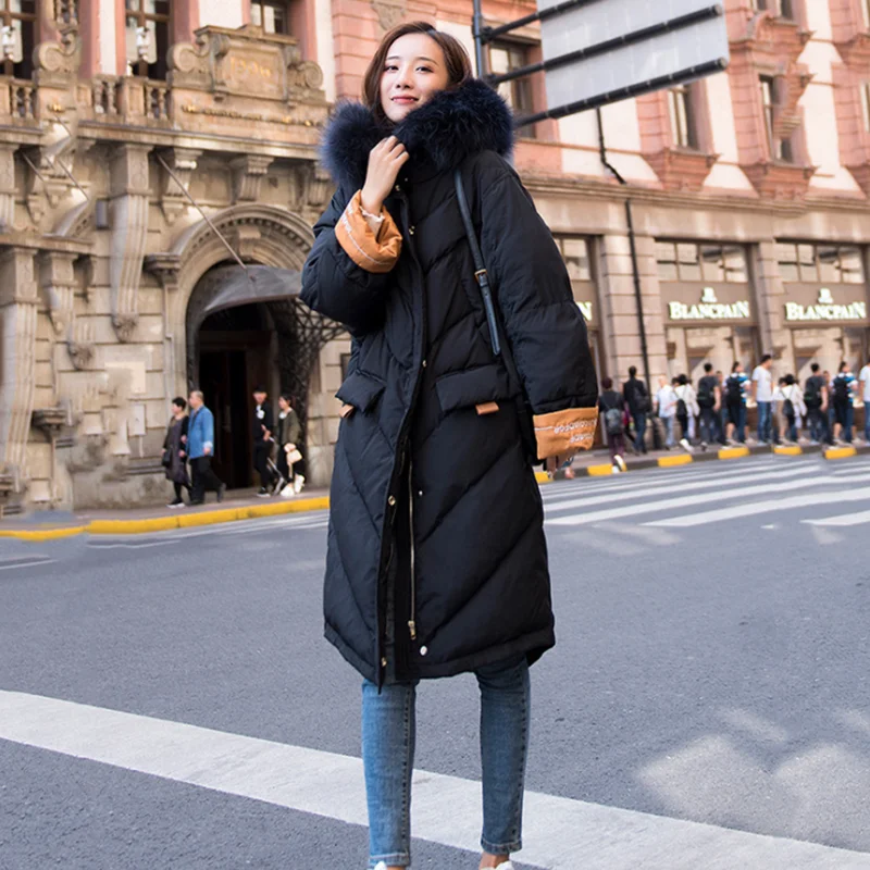 Женский длинный пуховик с воротником-стойкой однотонный теплый свободный из
