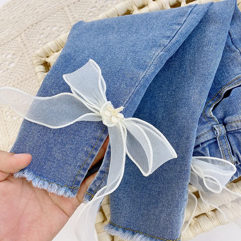 

Korean Baby Girls Spring Autumn Solid Denim Ribbon Bowknot Pants Kids Jeans Trousers For Teenagers Toddlers Sweet Pants For 1-7t