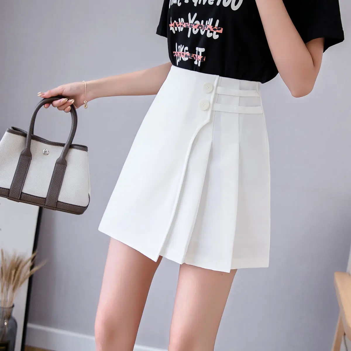 

2021 spring new half length skirt women's pleated skirt pants high waist A-line puffy ins super hot shorts skirt P47