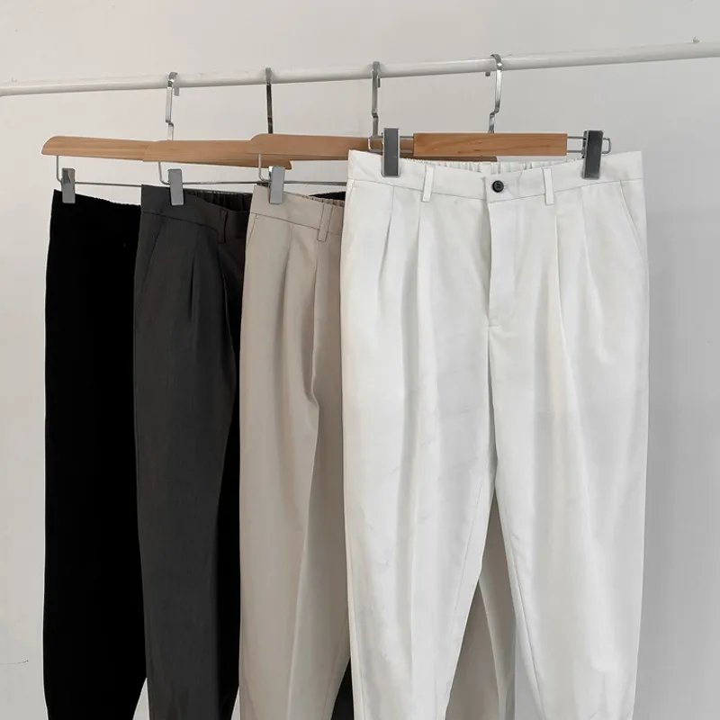 

2021 New Summer Men's White Suit Pants Korean Stylish Trousers Male Elastic Waist Solid Tapered Ankle Length Casual Pants Man