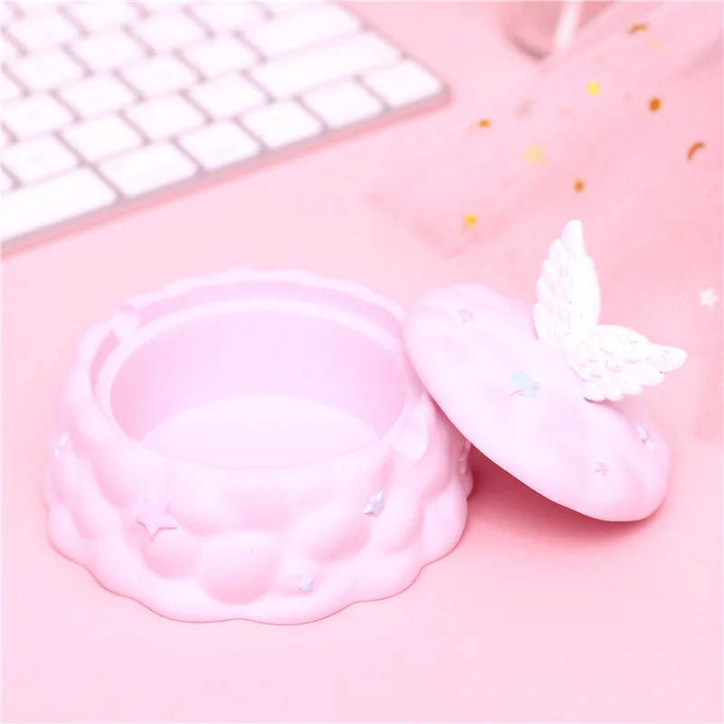 

Nordic ins wind flap angel ashtray creative personality trend light luxury furnishing articles deer head home sitting room.