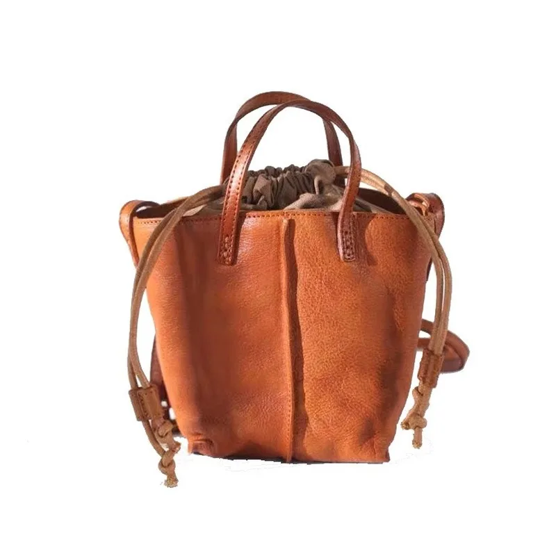 

Simple personality bucket bag vegetable tanned cowhide leather handbag handmade shoulder messenger bag temperament handbag