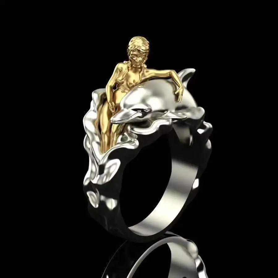 Фото Винтажное обручальное кольцо в виде дельфина золотого и серебряного цвета