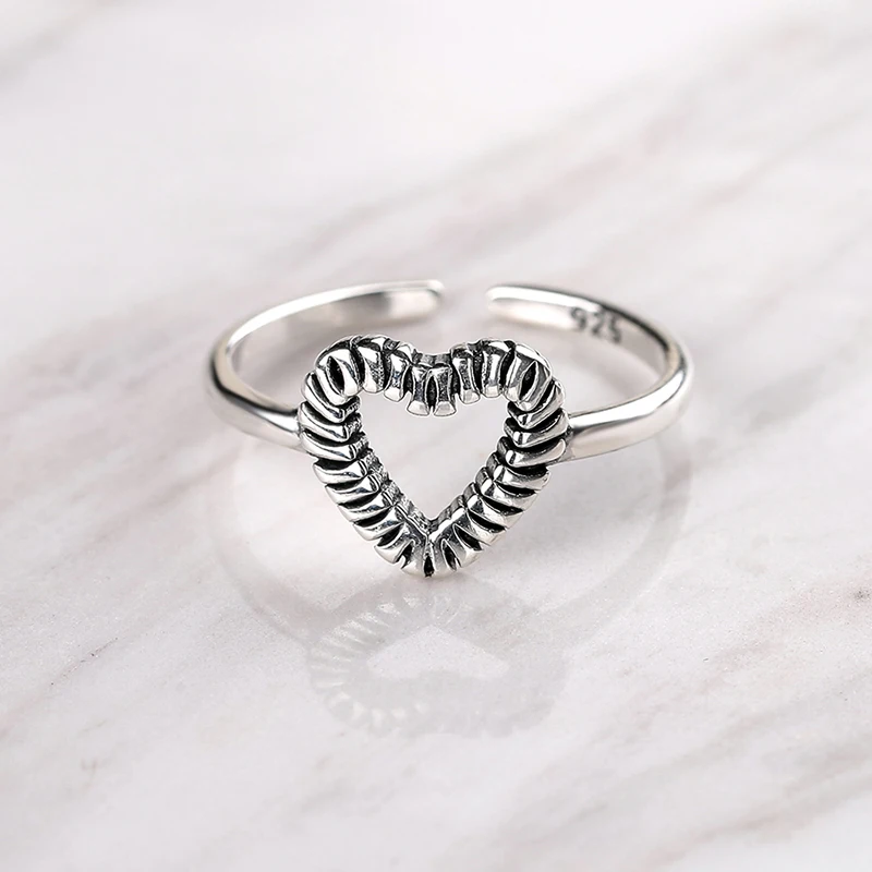 

Original fashion pure silver hollow heart embossed ring simple punk adjustable heart ring3
