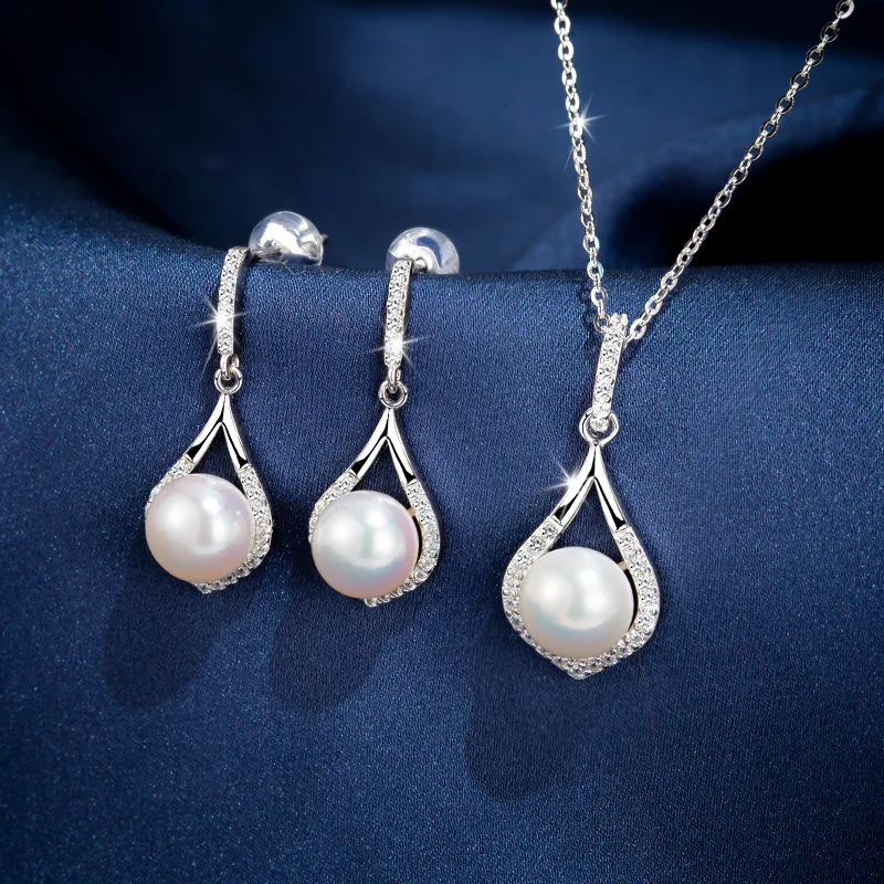 

Комплект из колье и серёг, из серебра пробы, с натуральным пресноводным жемчугом