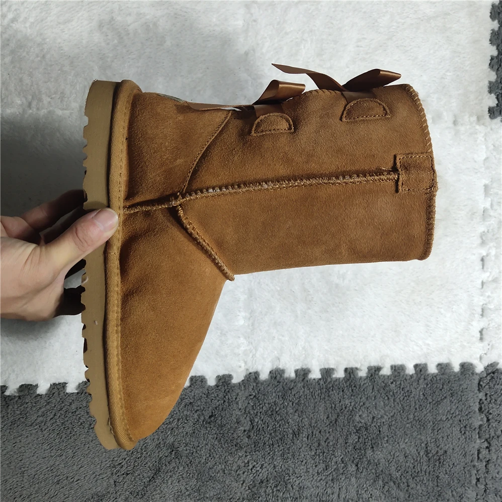 Женские замшевые сапоги из воловьей кожи с меховой подкладкой и бантиком - купить