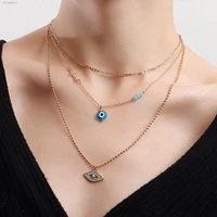 fallwinter trend micro diamond blue demon eye multilayer pendant necklace punk cross round bead chain ladies accessories