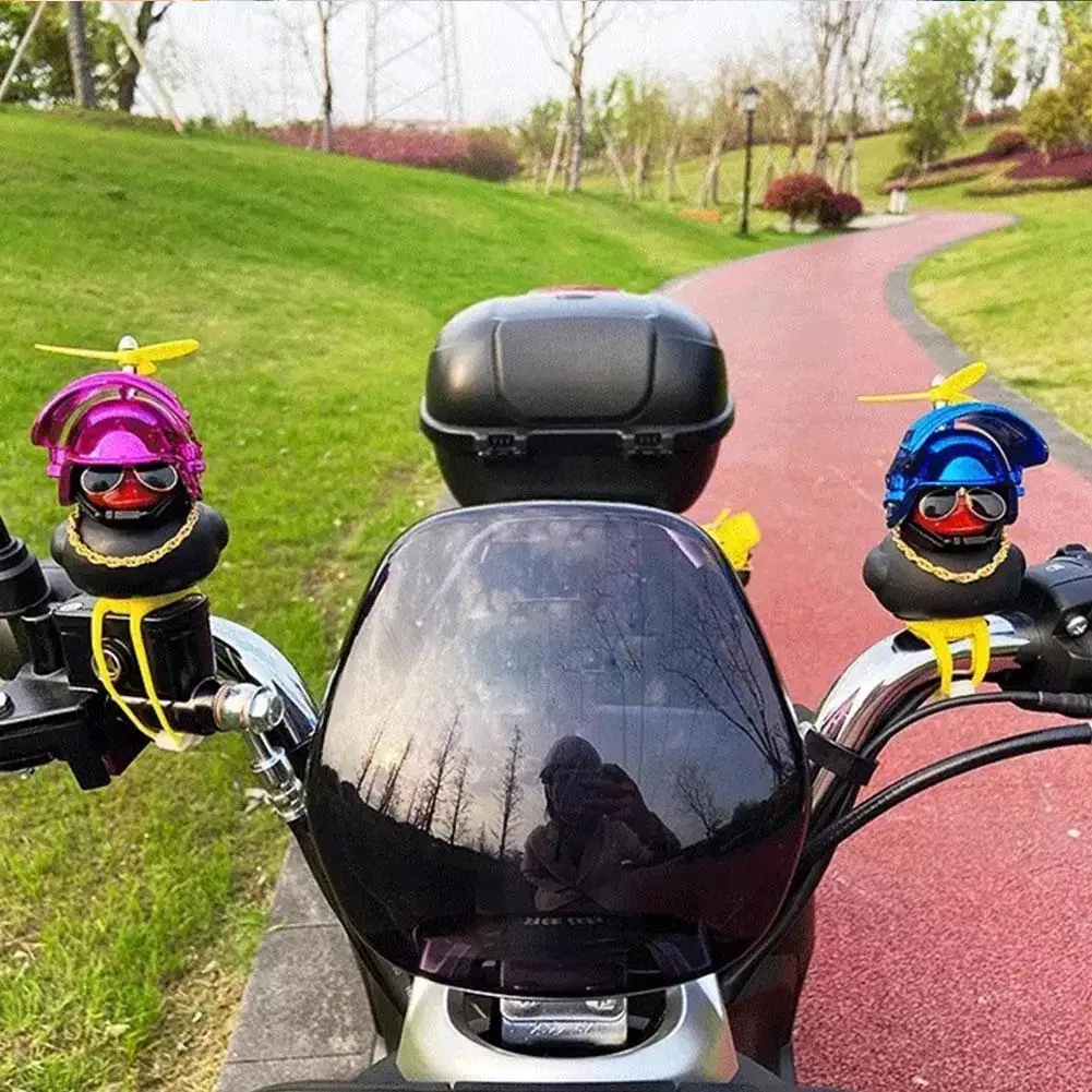 

Automotive Interior Yellow Duck With A Motor Bike Helmet Without Light Auto Parts
