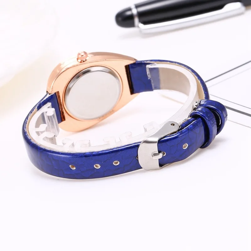 

New diamond luxury quartz watch snake head shape ladies belt watch Roman scale watch female clock student exam gift