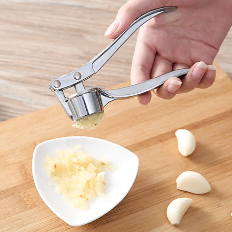 

Ручная разрезка чесночной пасты из нержавеющей стали