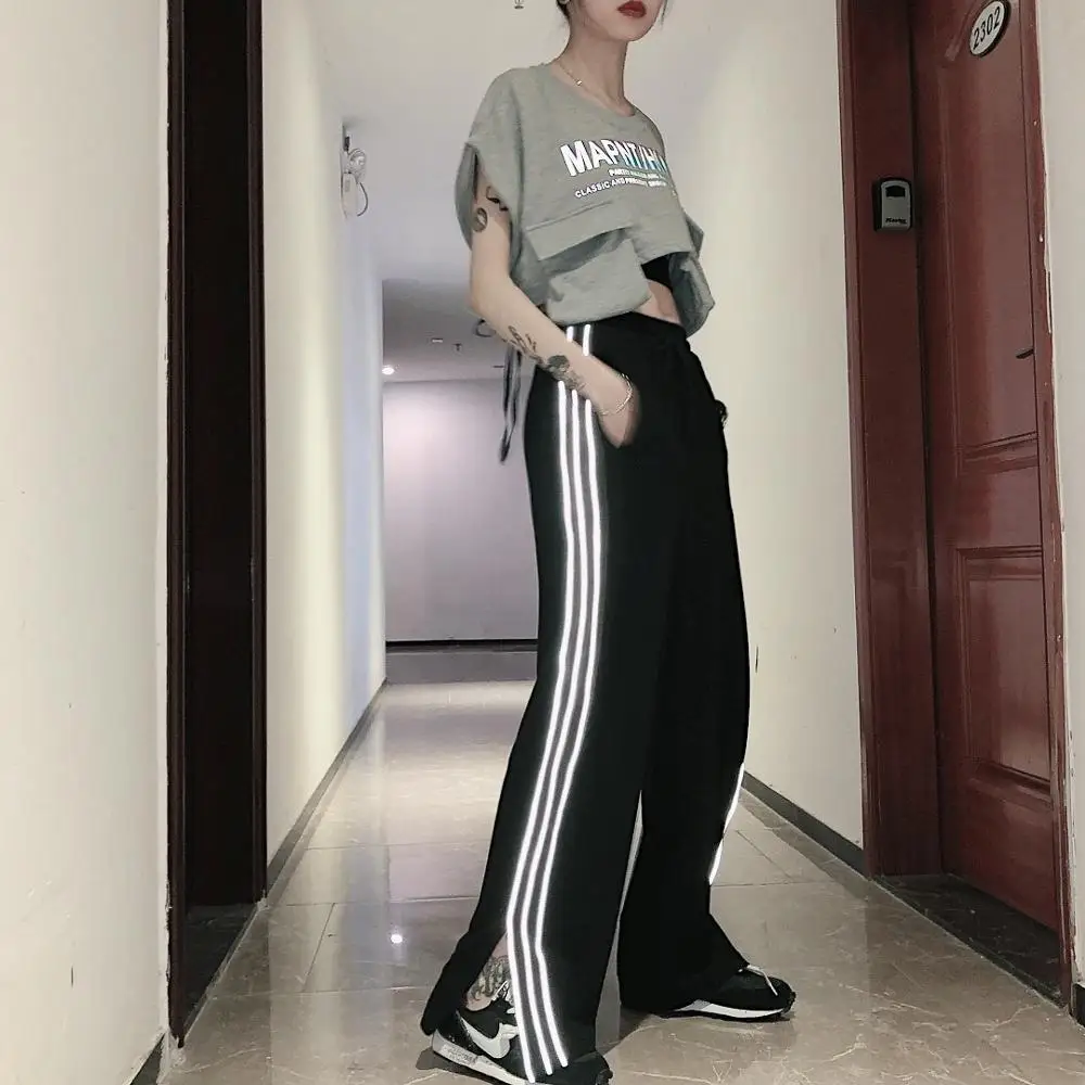 Уличные черные брюки с высокой талией и широкими штанинами со светоотражающими