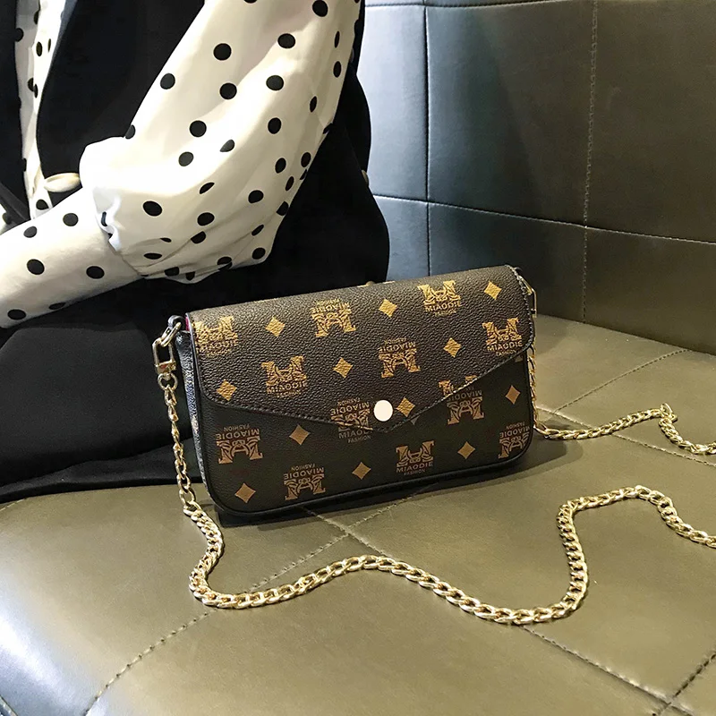 

2020 new three in one chain messenger bag envelope old flower high sense messenger bag three piece small women's bag