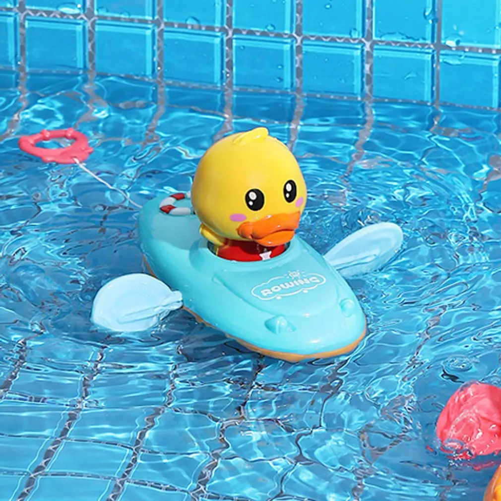 

Toys For Swimming Bathtub Pool Duck Toy Floating Ducklings Toy Manual Pull String Ducks Boat Paddler Bathtub Baby First Bath Toy