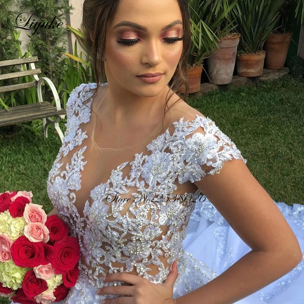 

Liyuke Stunning Off White A Line Wedding Dress With Rhinestones Cap Sleeve Gorgeous Bridal Dress