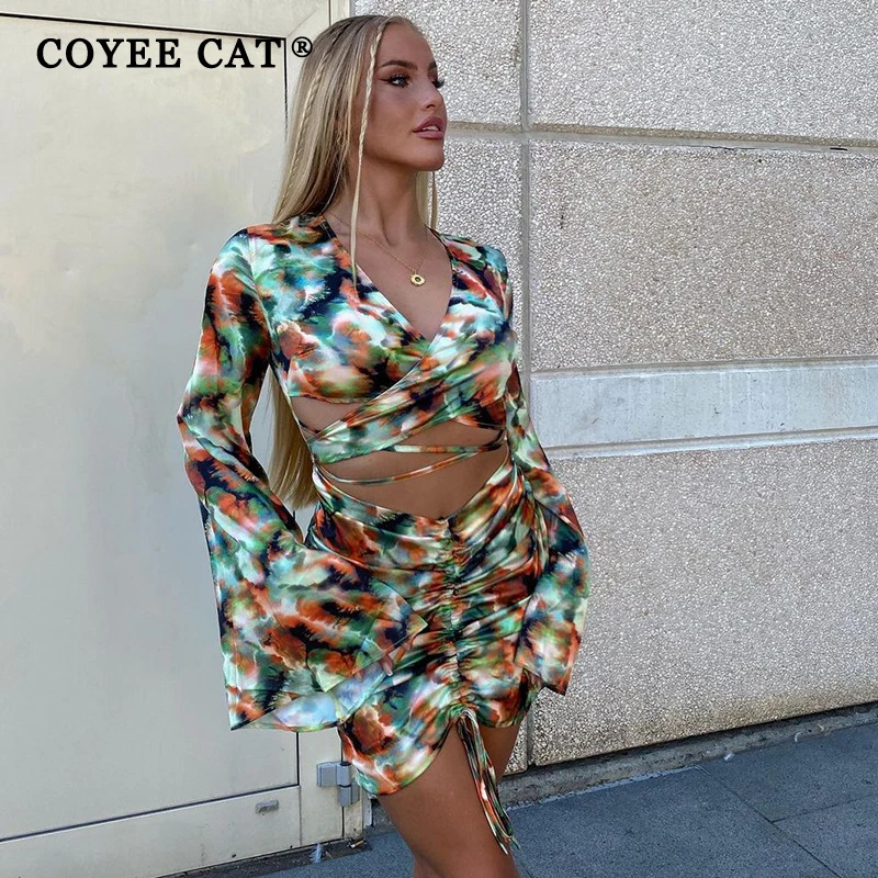 

CoyeeCat Tie Dye Drawstring Flared Long Sleeve Short Dress V-Neck Bodycon Women Dress Hollow Out Sexy Ladies Party Dress Autumn