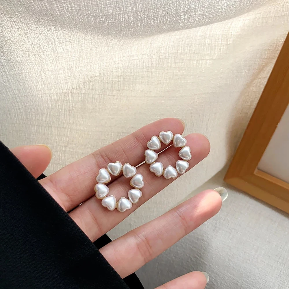 

Женские серьги-гвоздики с жемчугом, круглые