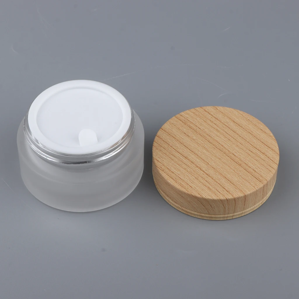 

Empty Clear Glass Sample Containers, Round Cosmetic Pot Jars with Wood Screw Cap