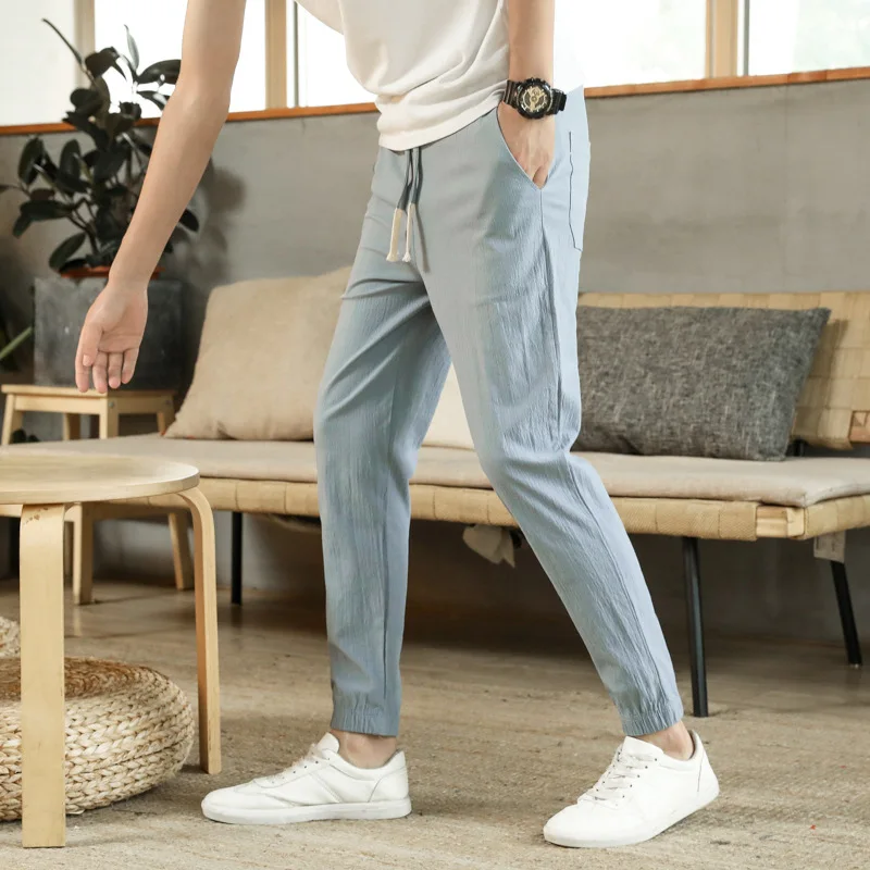 

Summer Men's Casual Cotton and Linen Nine Points Pants Loose Trend Beam Feet Feet Male Sports Harem Pants