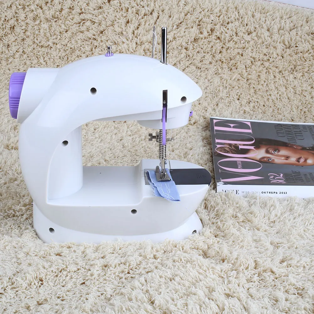 

Mini Electric Portable Desktop Sewing Machine Hand Held Household
