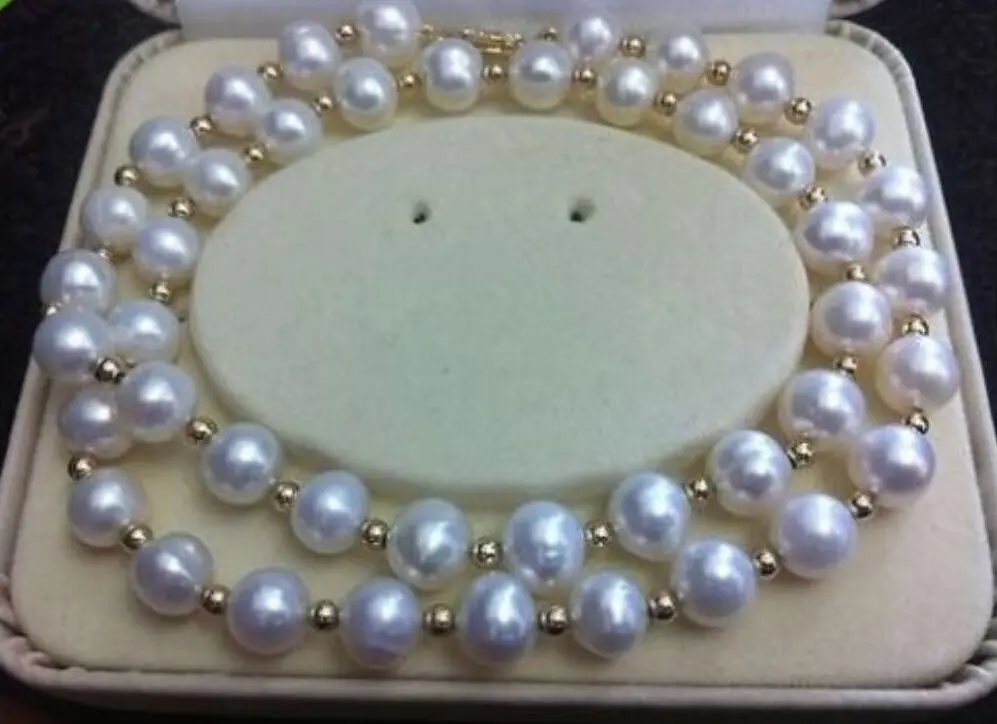

VERY CHARMING AAA+ 9-10MM AKOYA WHITE NATURAL PEARL NECKLACE 18iNCH