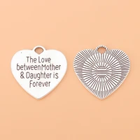 20pcslot %e2%80%98%e2%80%99the love between mother daughter is forever heart silver color charms pendants for necklace making accessories