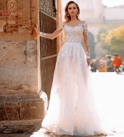 bohemian wedding dresses 2022 lace appliques full sleeves sheer neck illusion a line sweep train bride gowns elegant bridal
