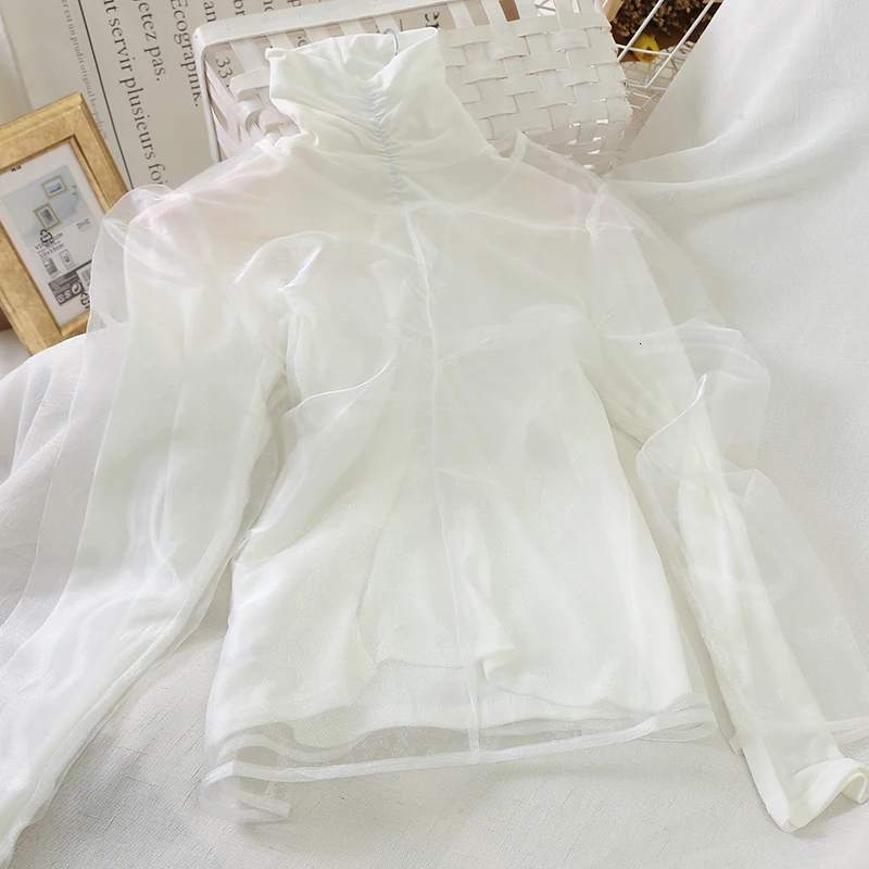 LANMREM 2020 Korean Version Of The New Winter Women's High Collar Long-sleeved Tight Puff Sleeve Perspective Shirt PC223 |