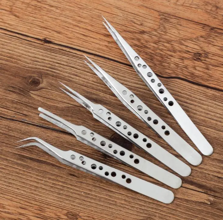 

With Holes Tweezer Whlesale ST - 10 12 13 14 15 Silver Polished 201# Stainless Steel Eyelash Tweezers Repair Tools 200pcs SN1459