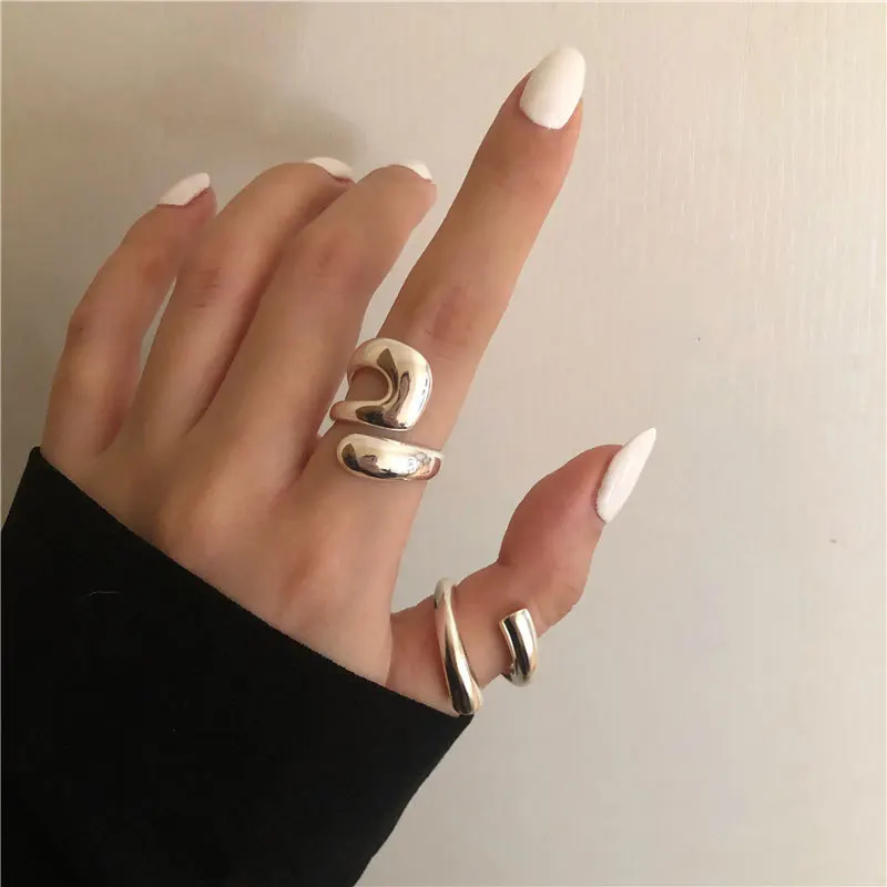 

925 silver plated ins niche designer high-end interlaced hollow tide personality irregular curve opening ring