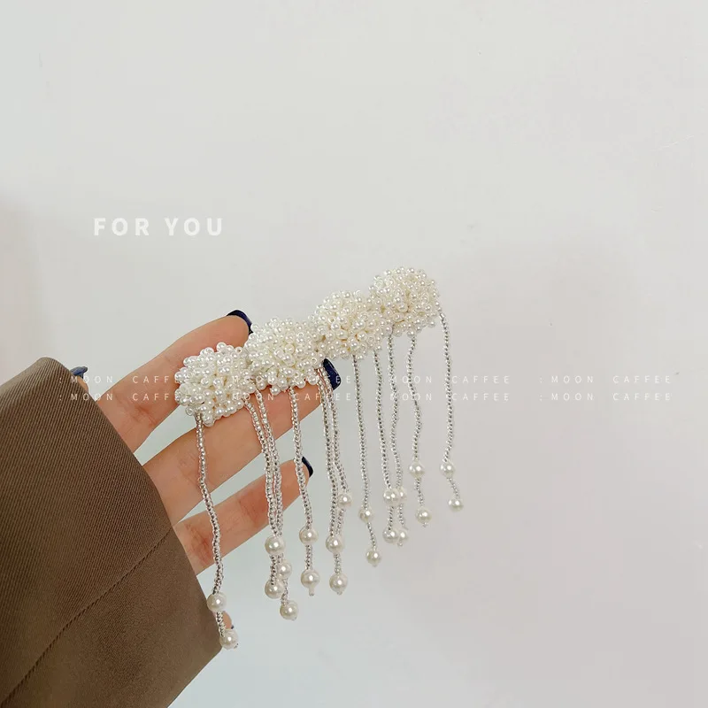 

2021 new super fairy pearl flower tassel hairpin spring clip top clip niche design sense retro hairpin girl hair accessories