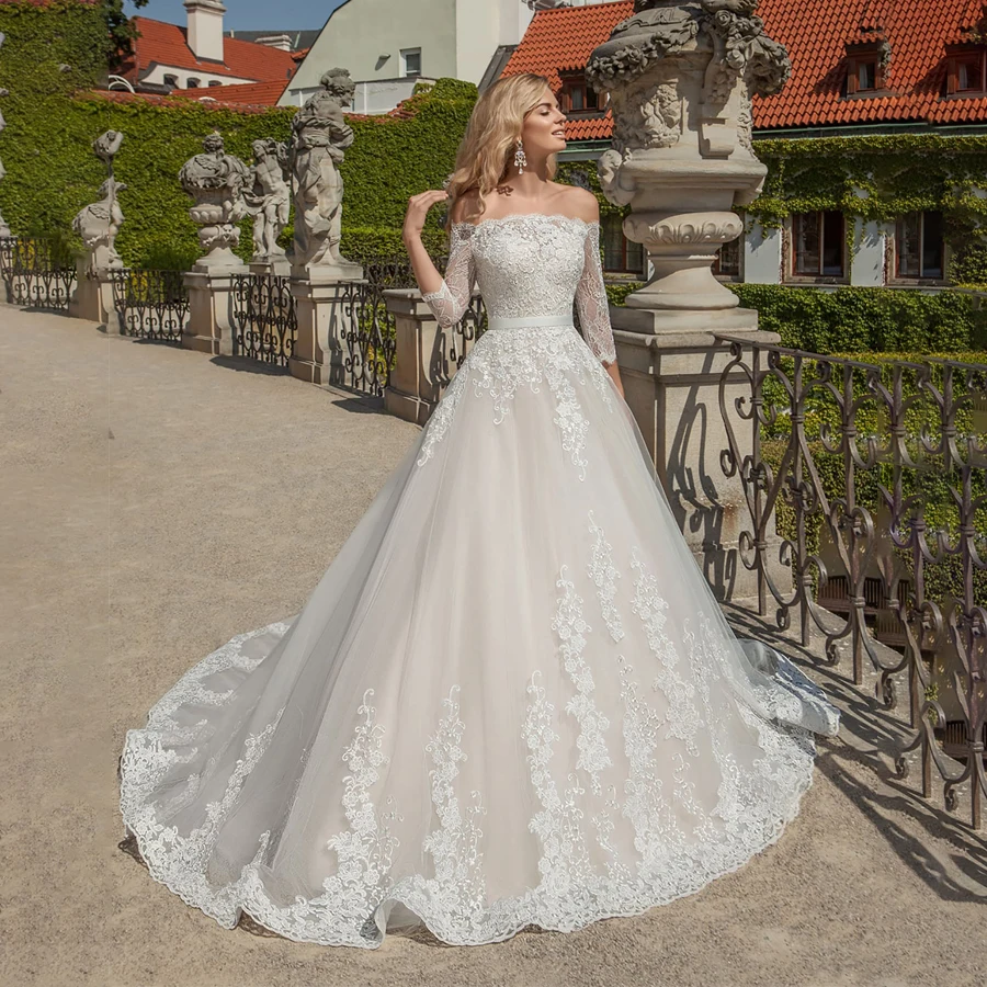 

Off the Shoulder 3/4 Sleeves Applique Lace Ball Gowns Champagne Wedding Dress with Long Satin Belt Bridal Dress robe de mariee