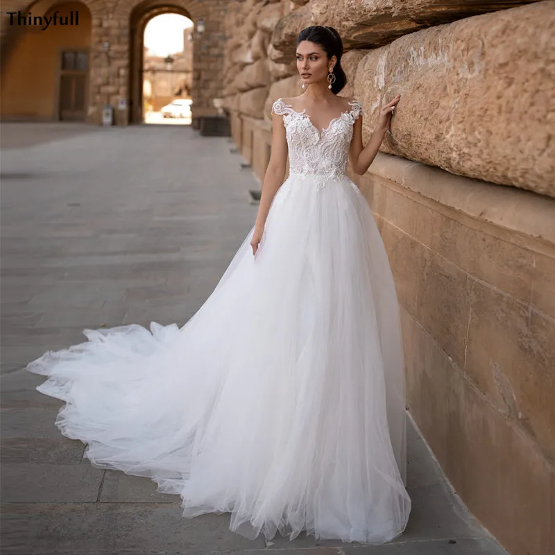 

Thinyfull/2021 пляжные свадебные платья с кружевной аппликацией и рукавами-крылышками; Платье для невесты; Прозрачные Свадебные платья принцессы;...