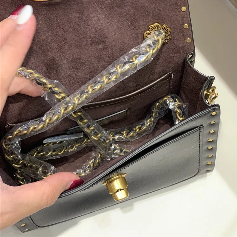 

2020 New leather handbag Camellia chain portable women's bag retro rivet single shoulder crossbite women's foreign trade bag