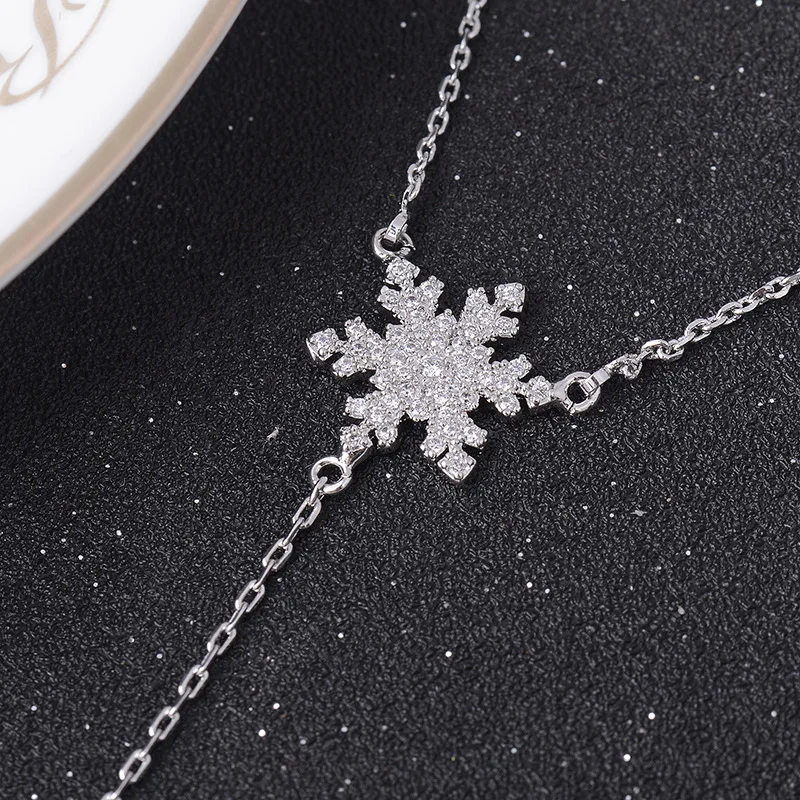 

Korean version of simple necklace micro-inlaid zircon snowflake pendant long pendant sexy sparkling clavicle chain female factor