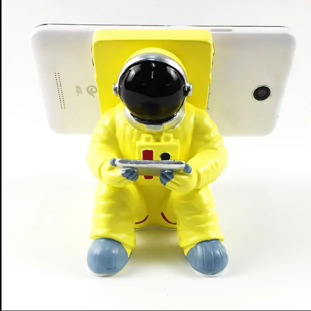 

Mobile phone holder Creative office desk decoration resin mobile phone holder astronaut household items home mobile phone holder