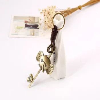 

Retro Jewelry Alloy Long Nose Elephant Leather Key Ring Woven Leather Key Knapsack Pendant K64 Key Chain Accessories Key Chain