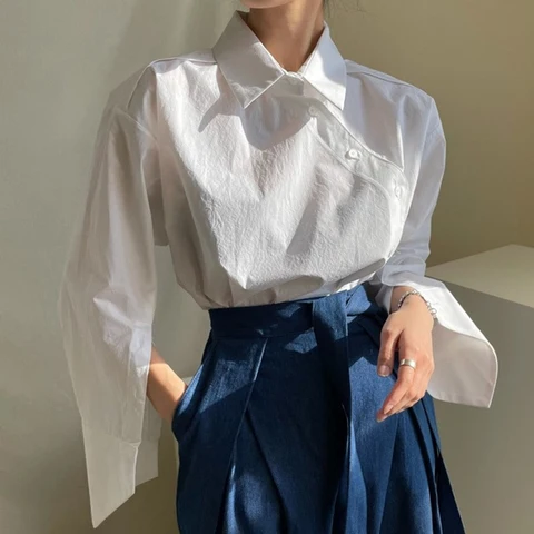 [EWQ] 2023 Spring autumn Women Casual Blouse Asymmetrical Single Breasted Turn-down Collar Long-sleeved Panelled Striped Shirt