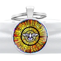 the catholic holy spirit pigeon glass dome metal keychain