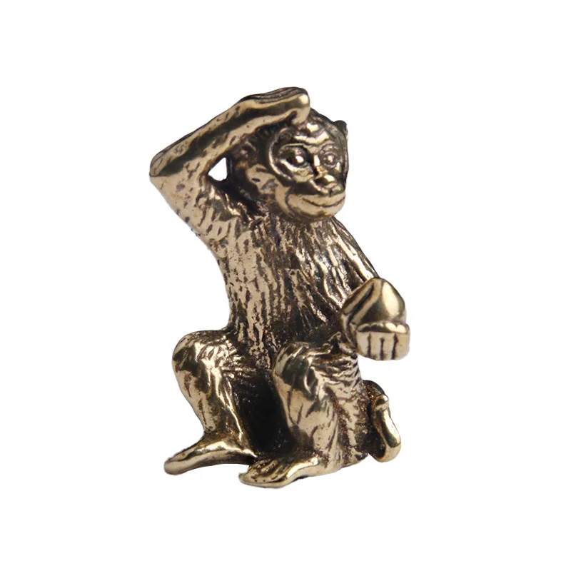 

Статуэтка обезьянки из латуни