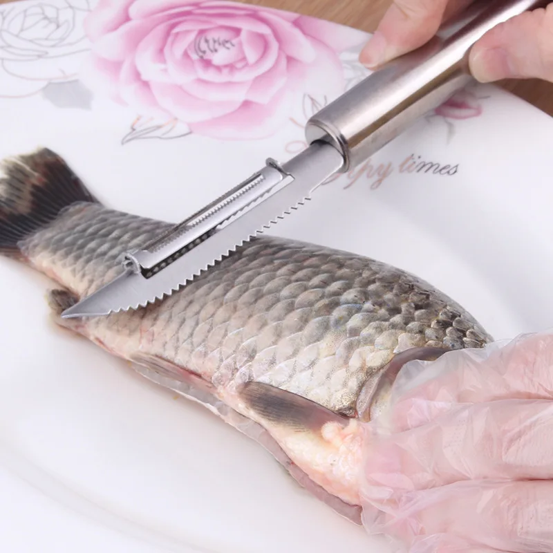 

Stainless Steel Multi-functional Fruit Slicer Peeler Creative Paragraph Scales the Scraping Scales the Kitchen Gadgets